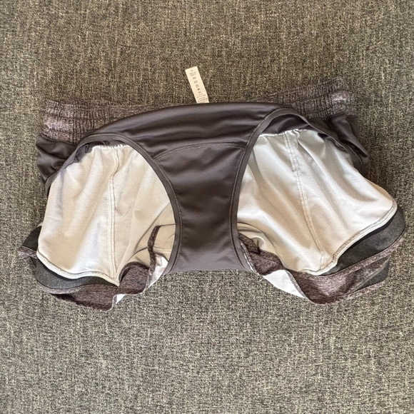 Lululemon 12 Hotty Hot Short II 2.5"'
Heather Lux Multi Black / Heathered Black - Picture 8 of 12